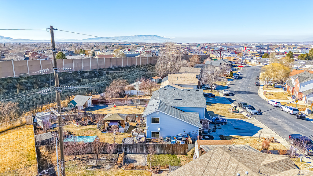 Birds eye view of property featuring a residential view and a mountain view