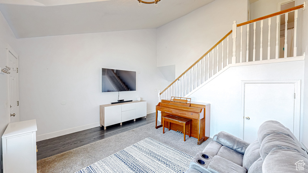 Living room featuring baseboards and wood finished floors