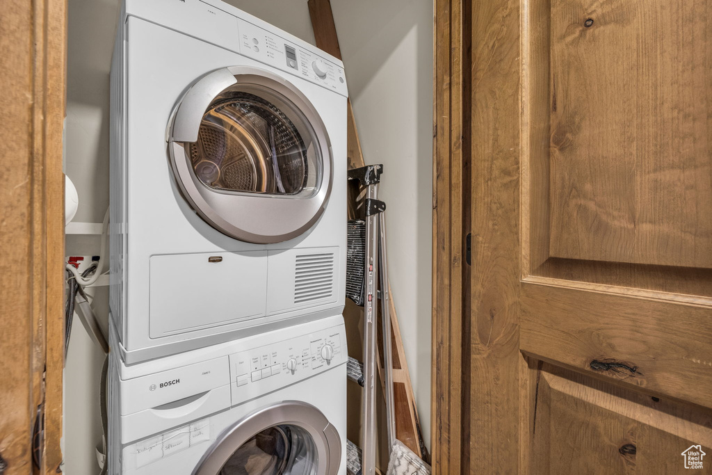 Washroom with stacked washer / dryer