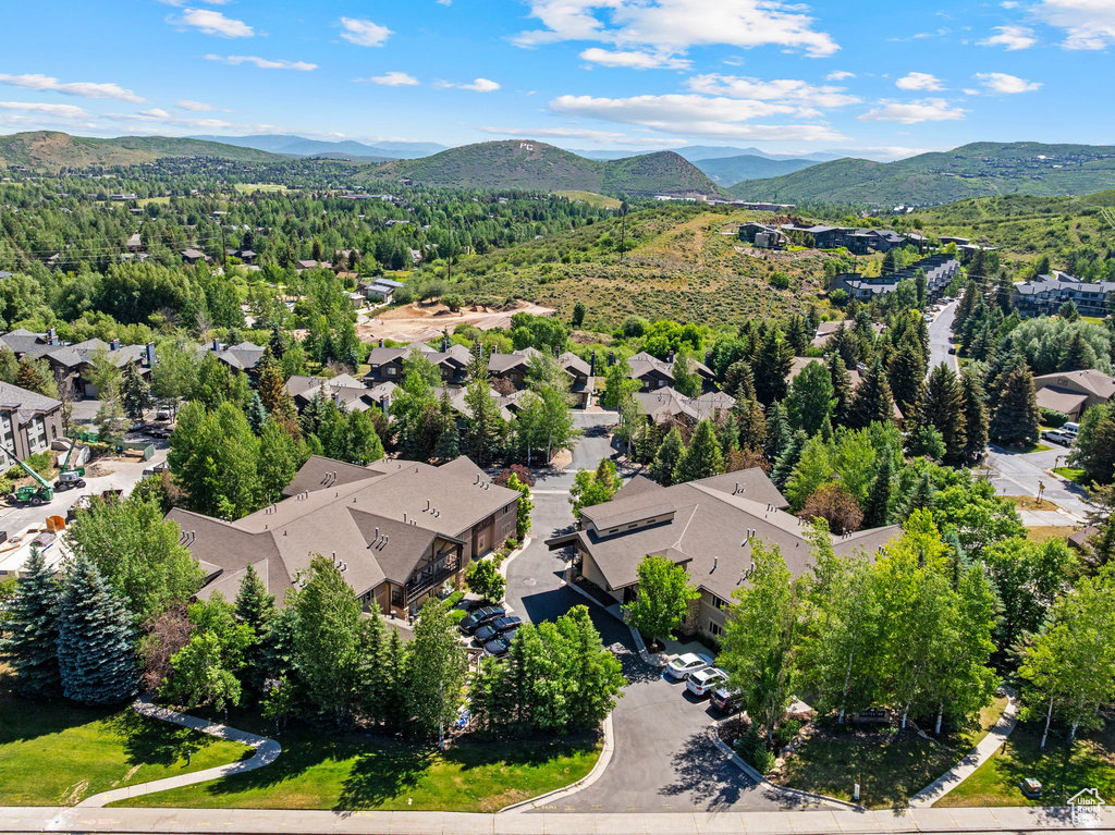 Aerial perspective of suburban area with a mountain backdrop