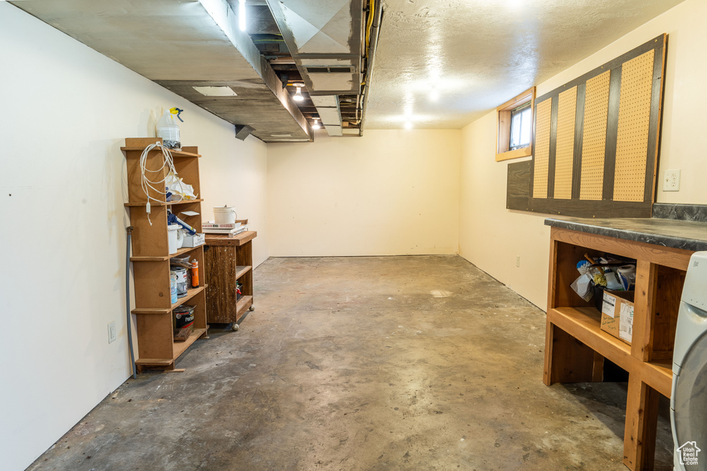 Basement featuring washer / clothes dryer