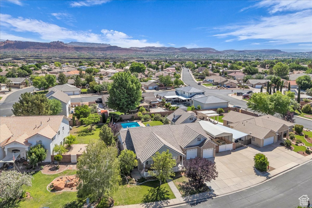 Aerial perspective of suburban area featuring mountains