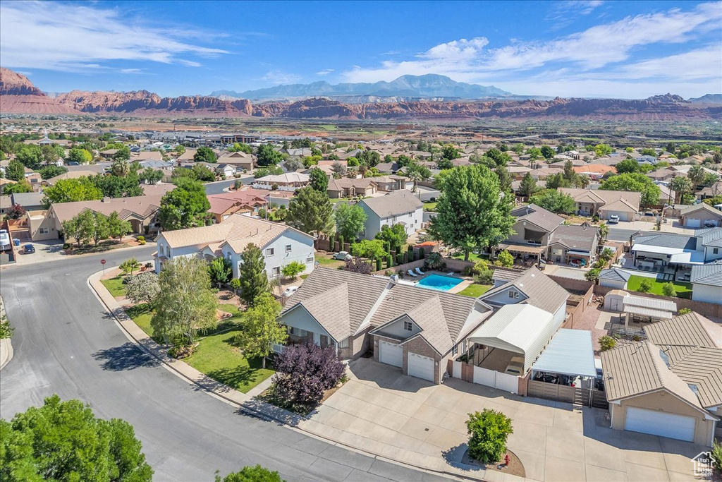Aerial perspective of suburban area with mountains