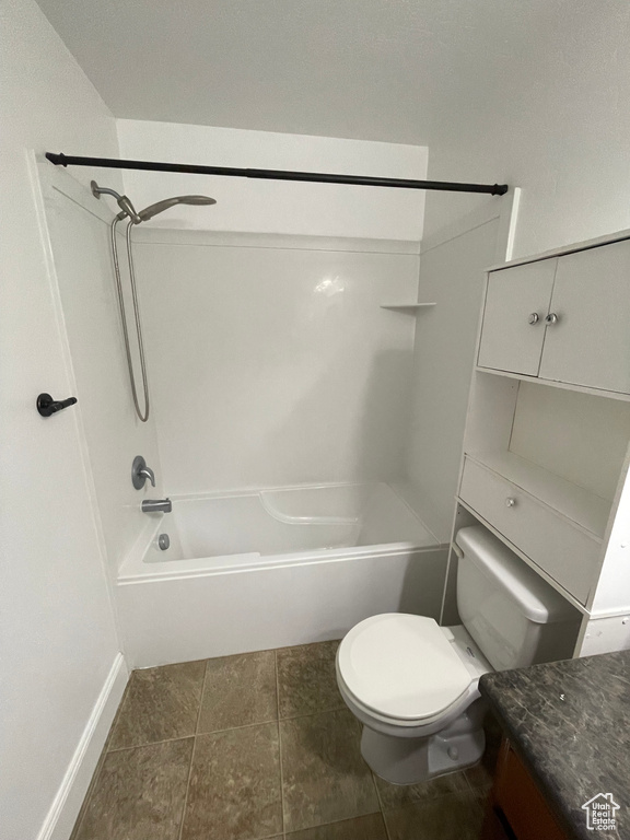 Full bath featuring toilet, shower / tub combination, and vanity
