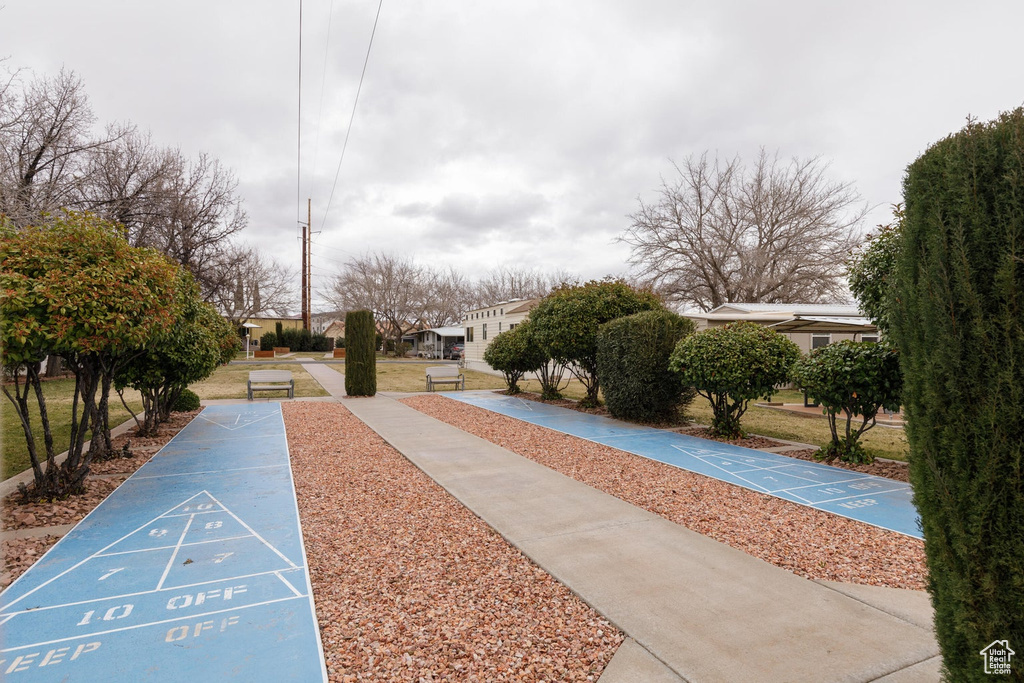 View of community with shuffleboard and a residential view