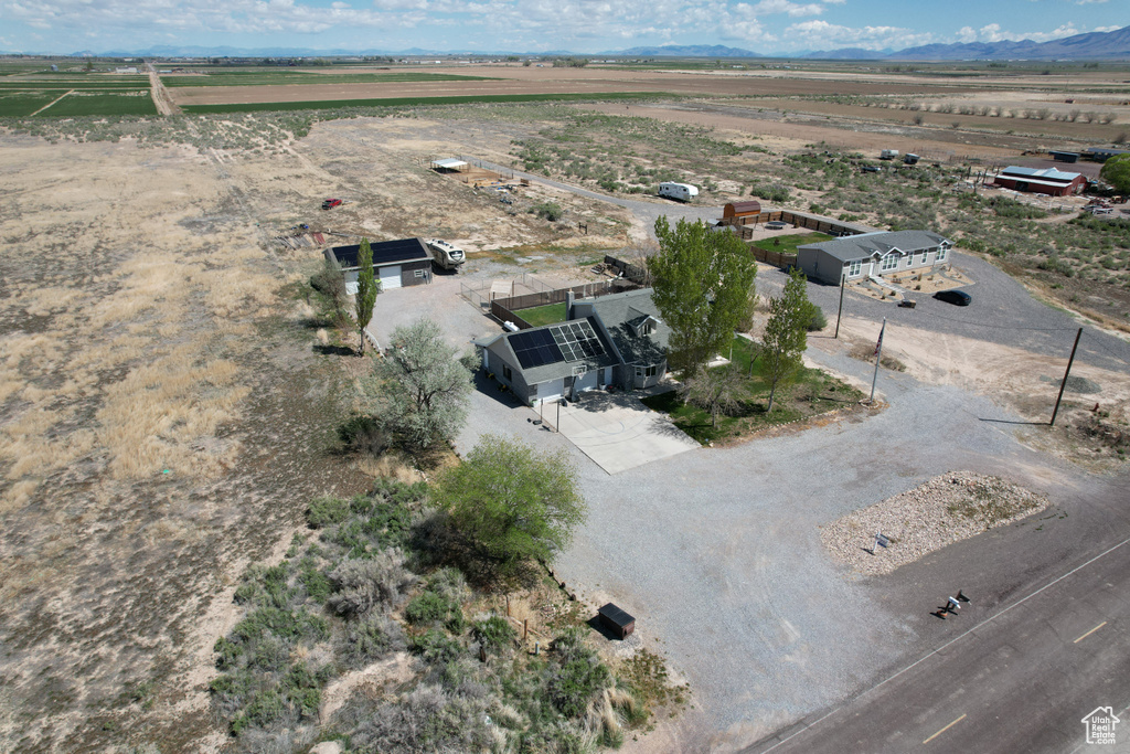 Drone / aerial view with a mountain view and a rural view