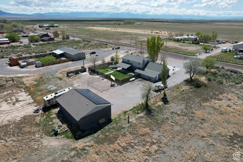 Drone / aerial view with a mountain view and a rural view
