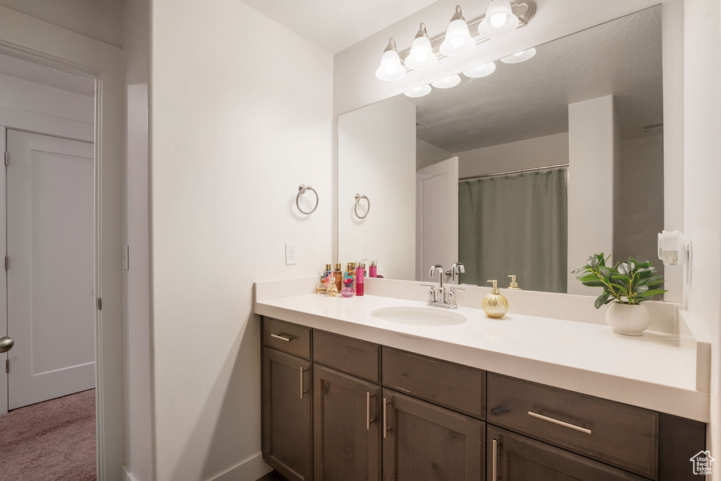 Full bathroom featuring vanity