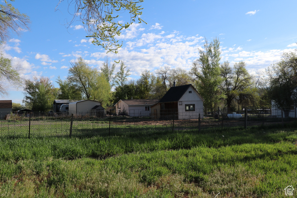 View of yard with fence