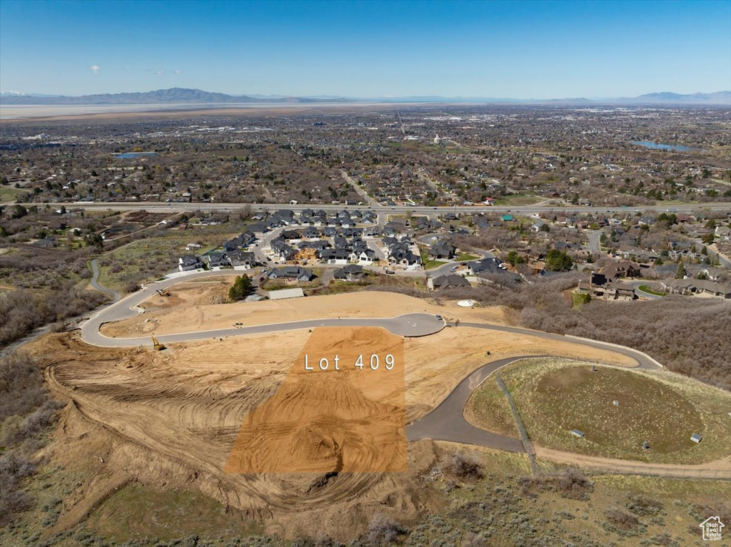 Birds eye view of property featuring a mountain view