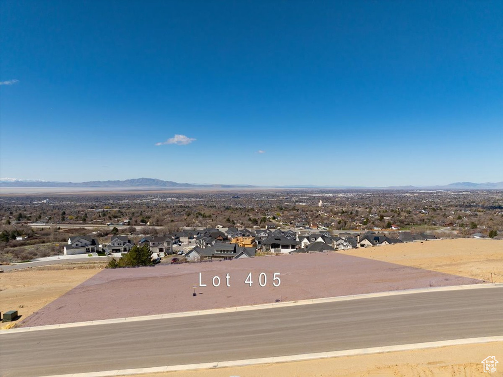 Drone / aerial view with a mountain view and a residential view