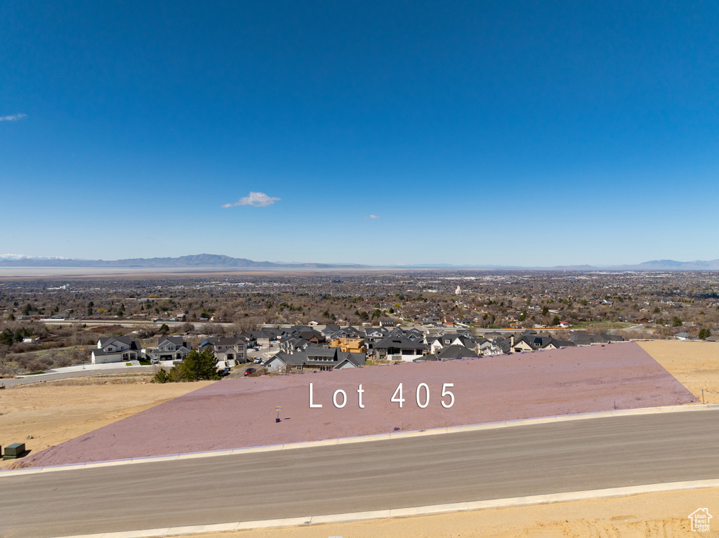 Drone / aerial view featuring a mountain view and a residential view