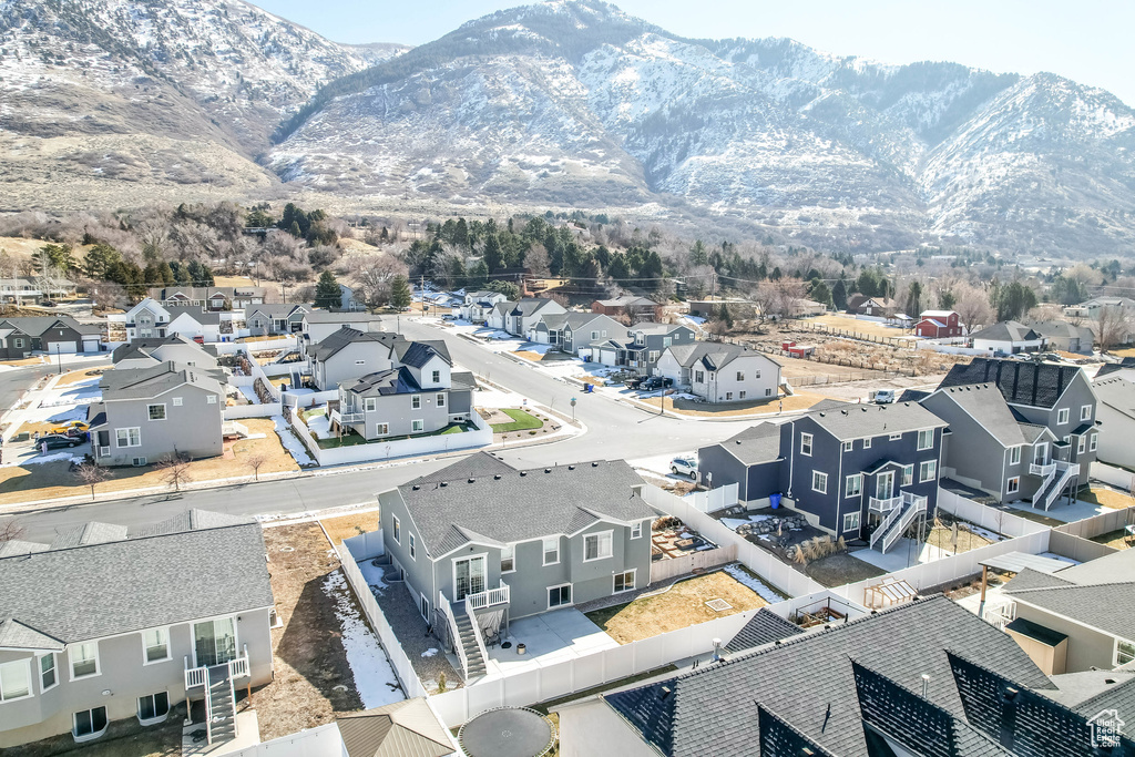 Exterior space featuring a residential view and a mountain view
