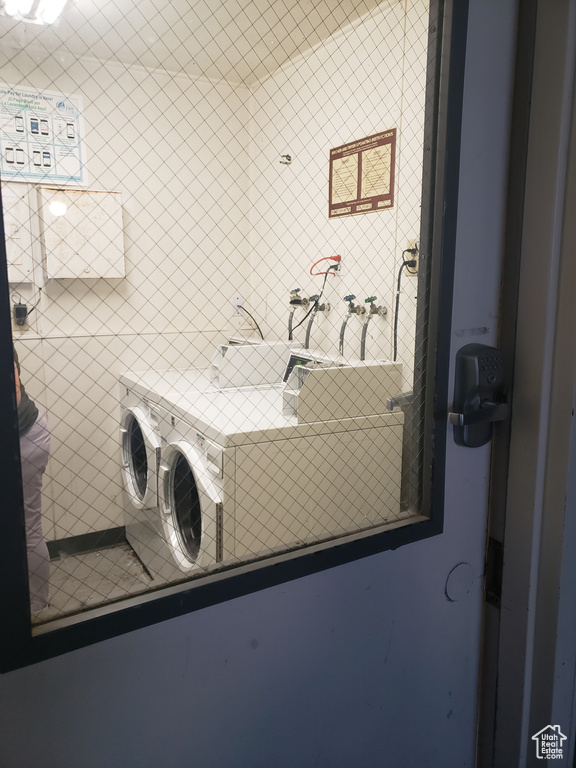 Washroom featuring washer / clothes dryer