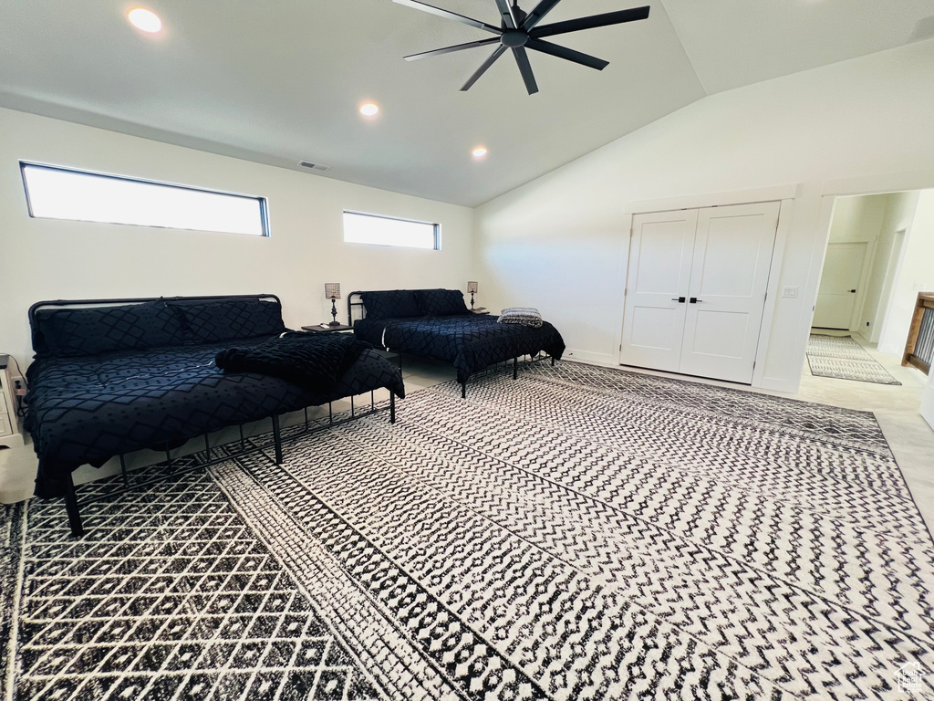 Bedroom featuring lofted ceiling, visible vents, a ceiling fan, and recessed lighting
