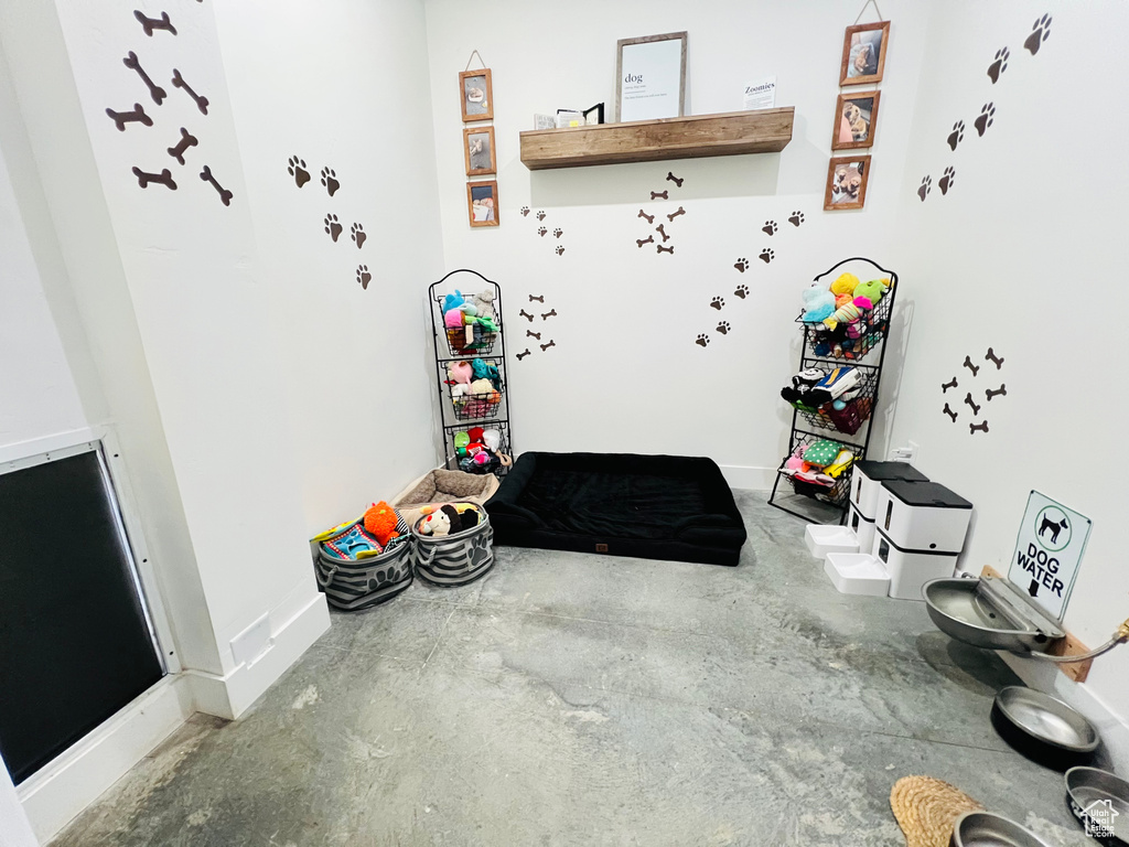 Interior space with concrete floors and baseboards