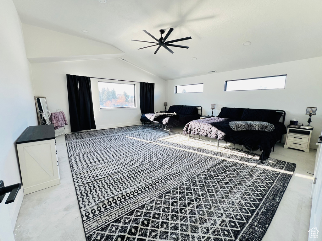 Bedroom with vaulted ceiling
