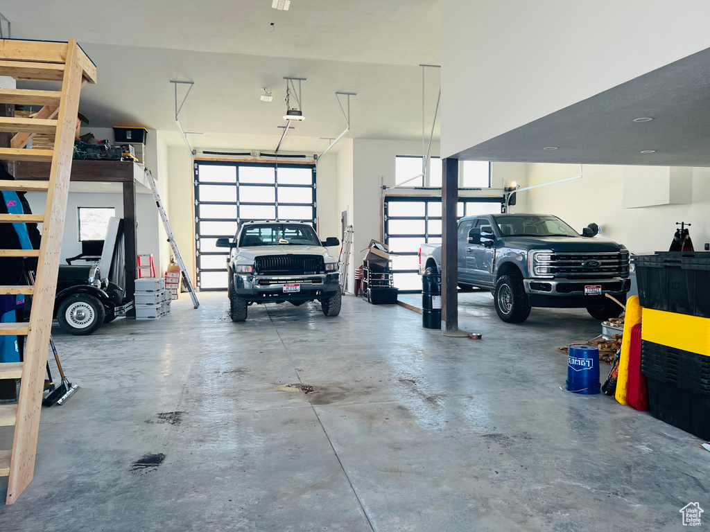 Garage featuring a garage door opener
