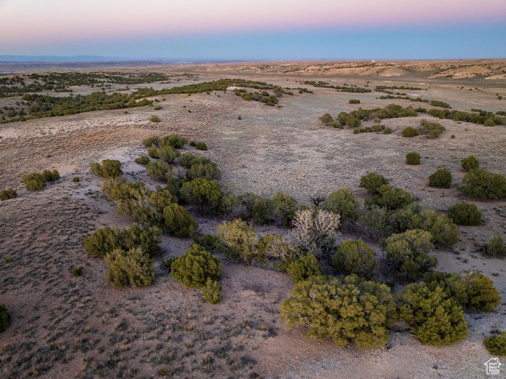 Bird's eye view with view of desert and a rural view