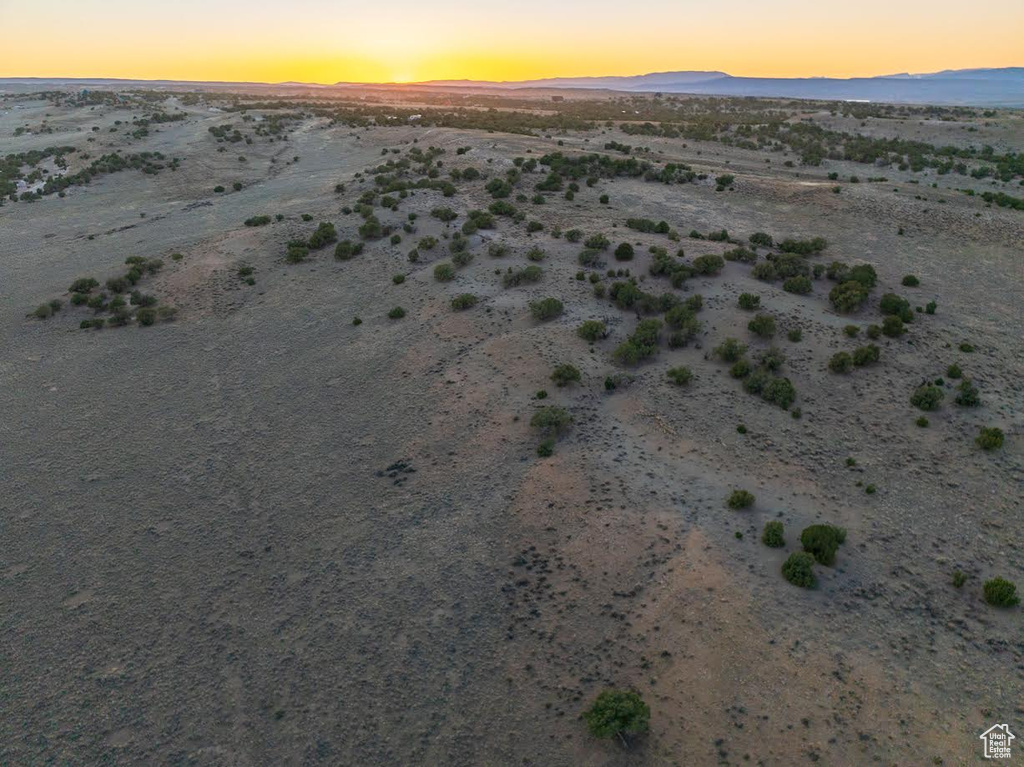 Birds eye view of property featuring a rural view, a mountain view, and a desert view