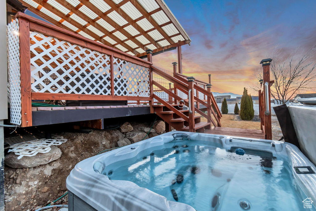 Exterior space featuring a hot tub