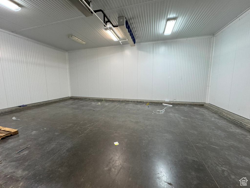 Garage featuring metal wall