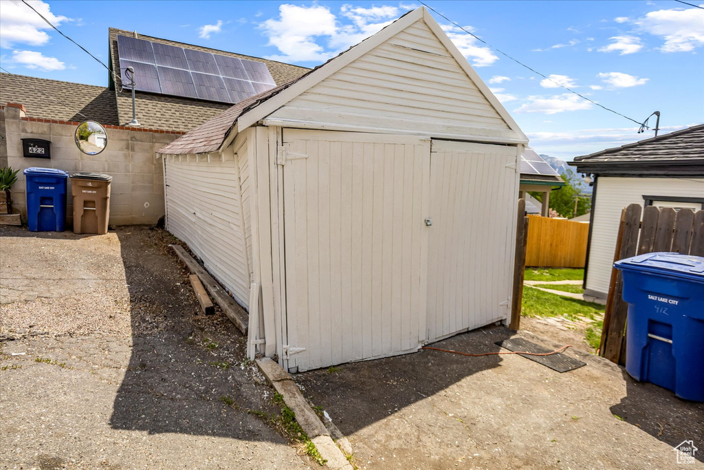 View of shed featuring a fenced backyard