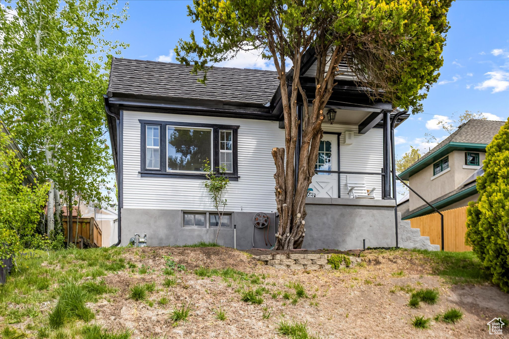 View of front of house with fence