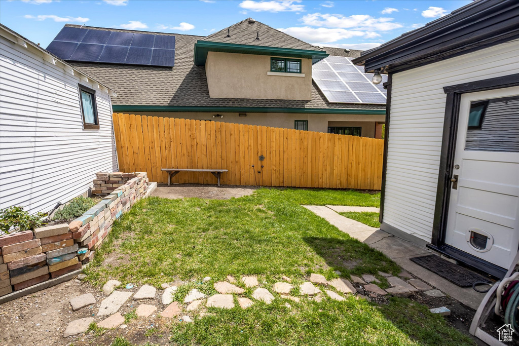 View of yard featuring fence