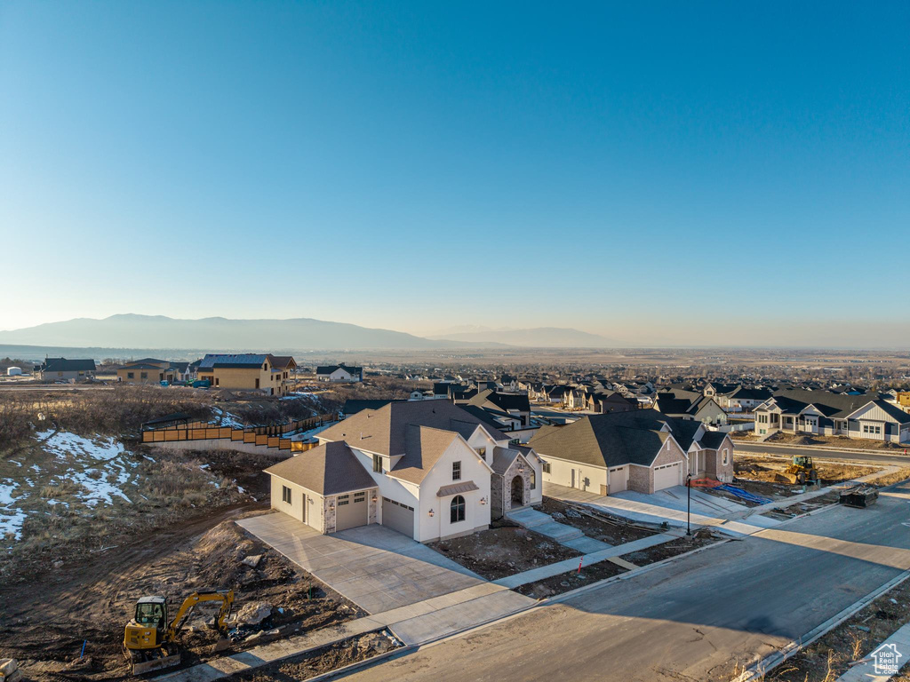 Drone / aerial view with a residential view and a mountain view