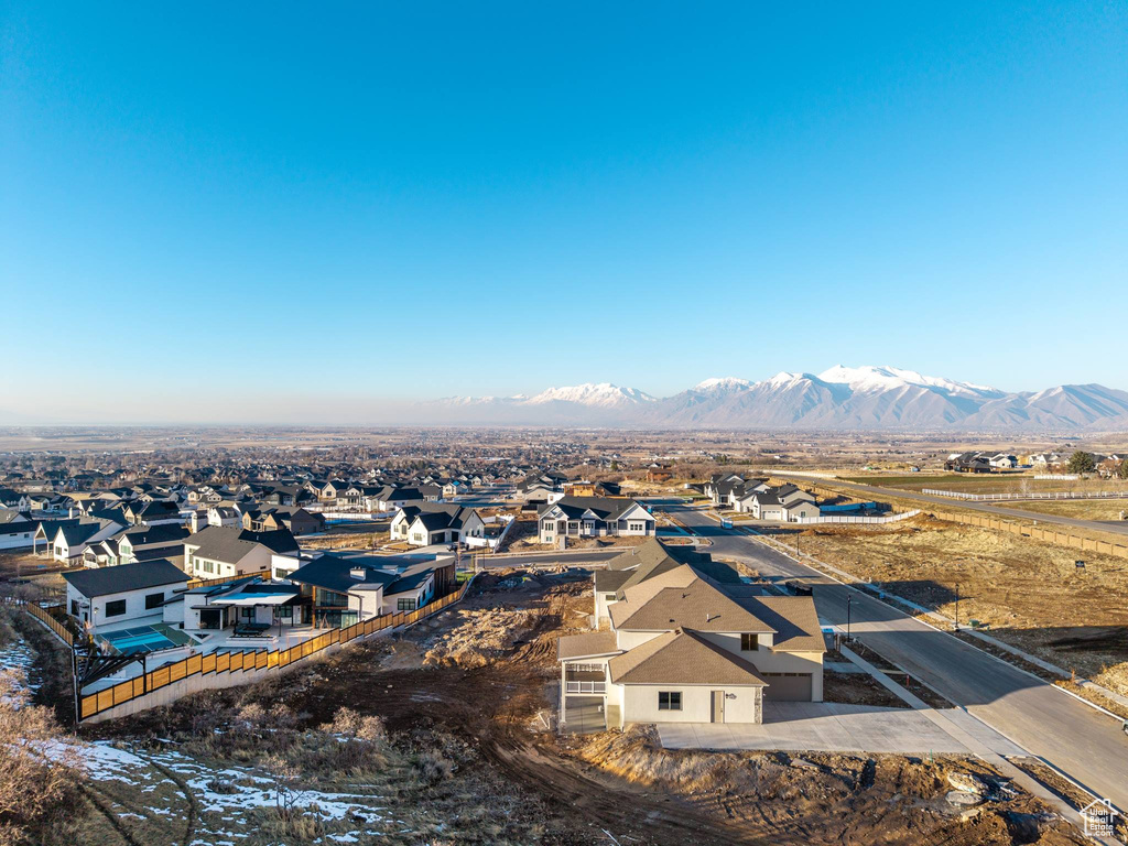 Birds eye view of property featuring a residential view and a mountain view