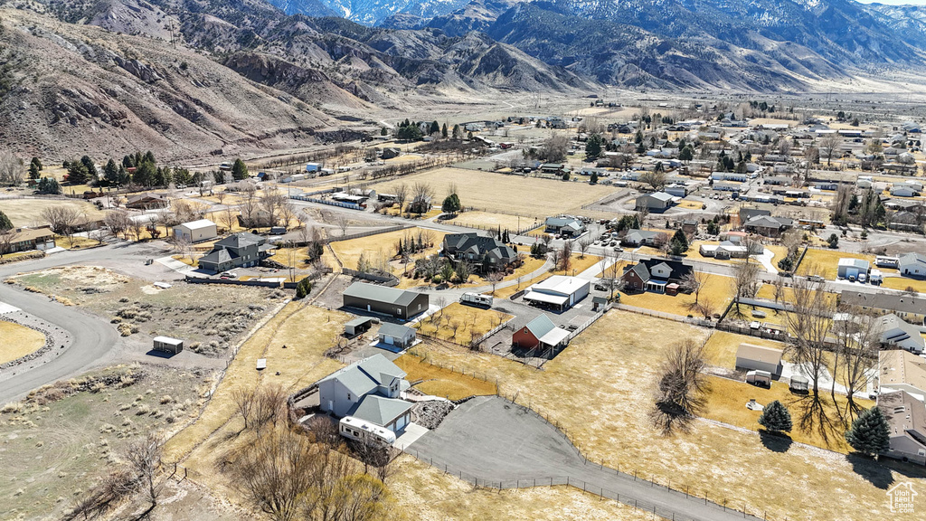 Birds eye view of property featuring a residential view and a mountain view