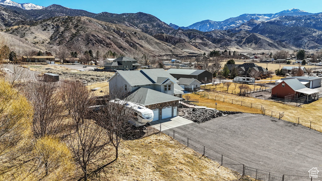 Aerial view featuring a mountain view and a residential view