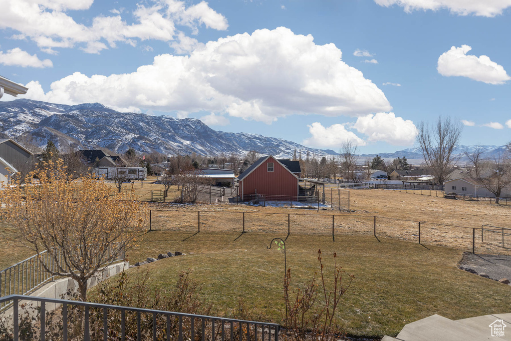 Property view of mountains with a rural view