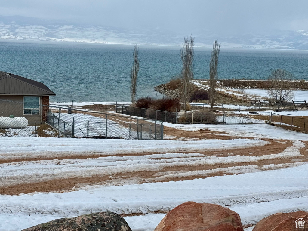 Water view with fence