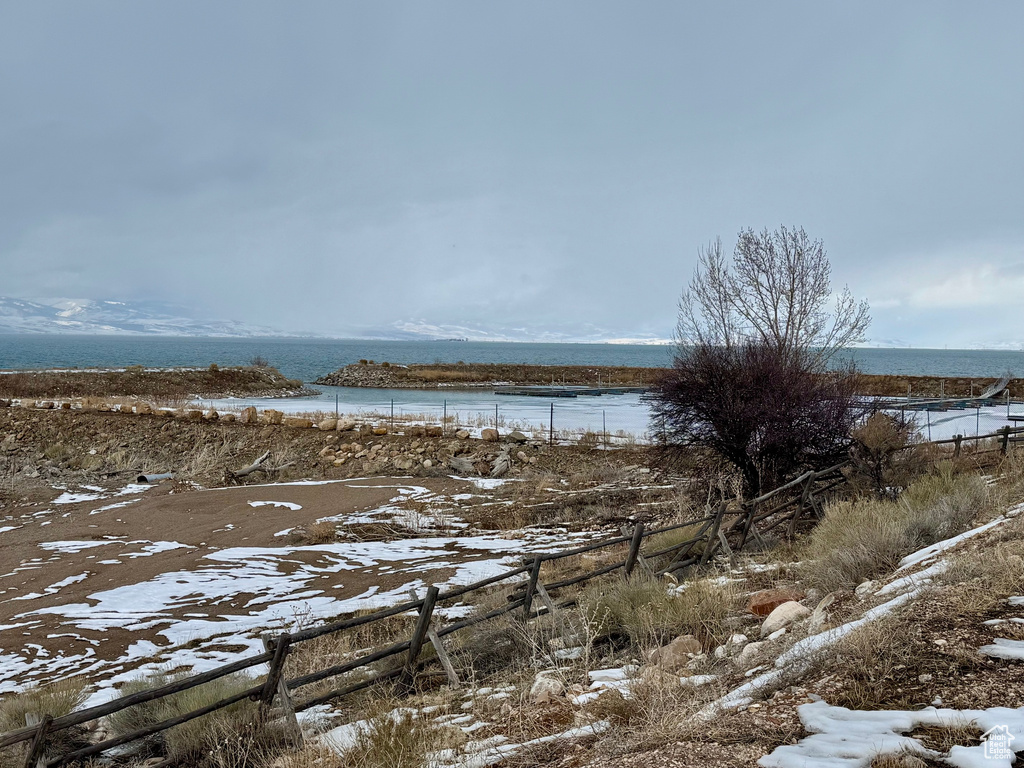 Property view of water with fence