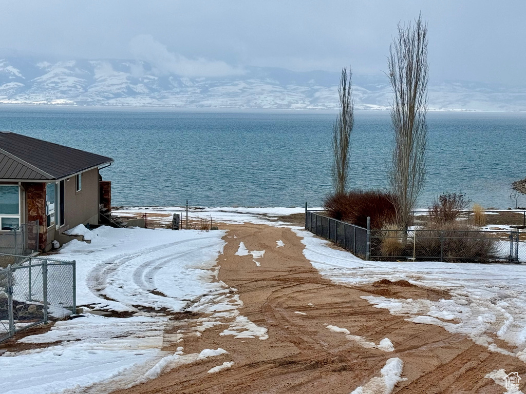 Property view of water with fence