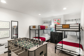 Bedroom with recessed lighting and carpet floors