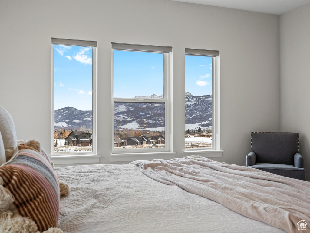 Bedroom featuring a mountain view