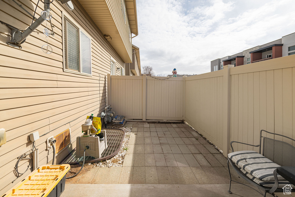 View of patio featuring a fenced backyard