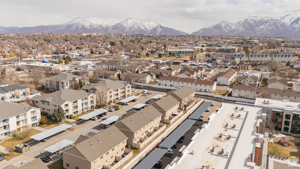 Drone / aerial view featuring a residential view and a mountain view