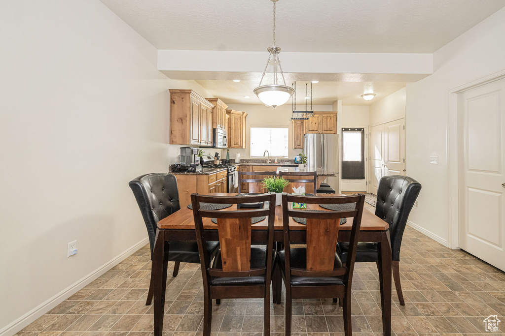 Dining room featuring baseboards