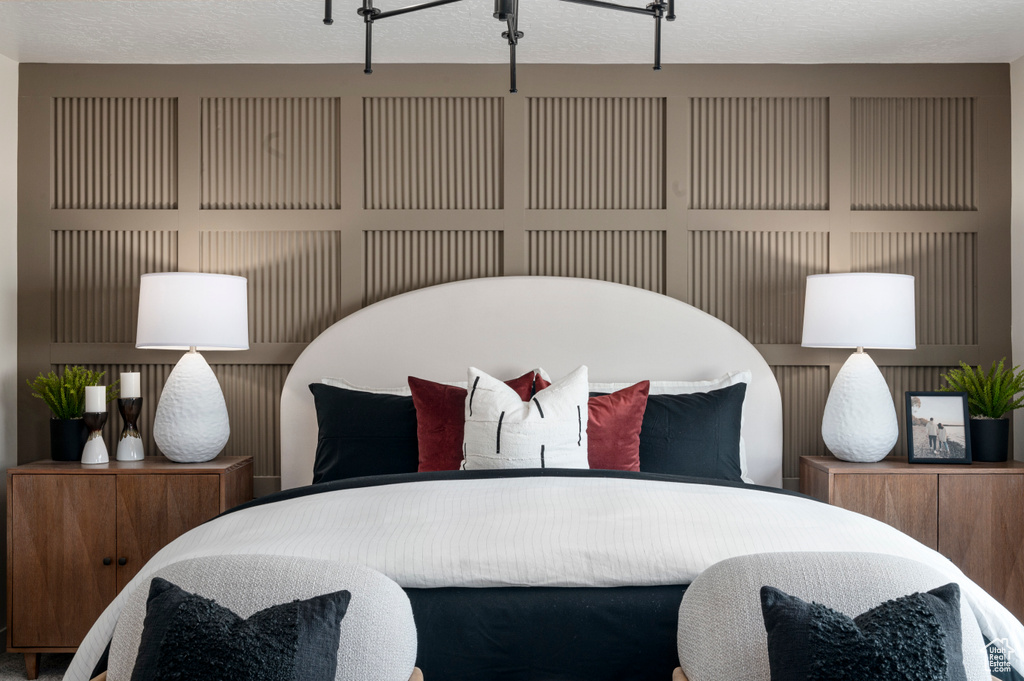 Bedroom with a textured ceiling