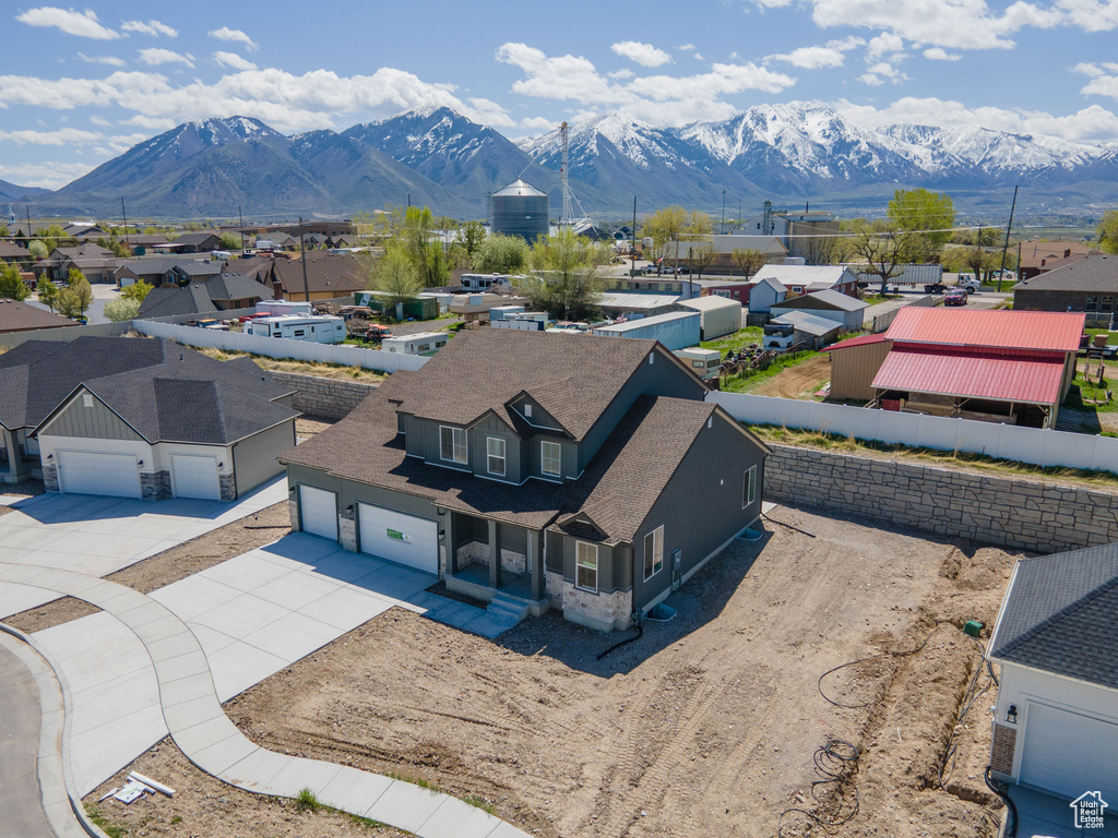 Birds eye view of property featuring a mountain view and a residential view