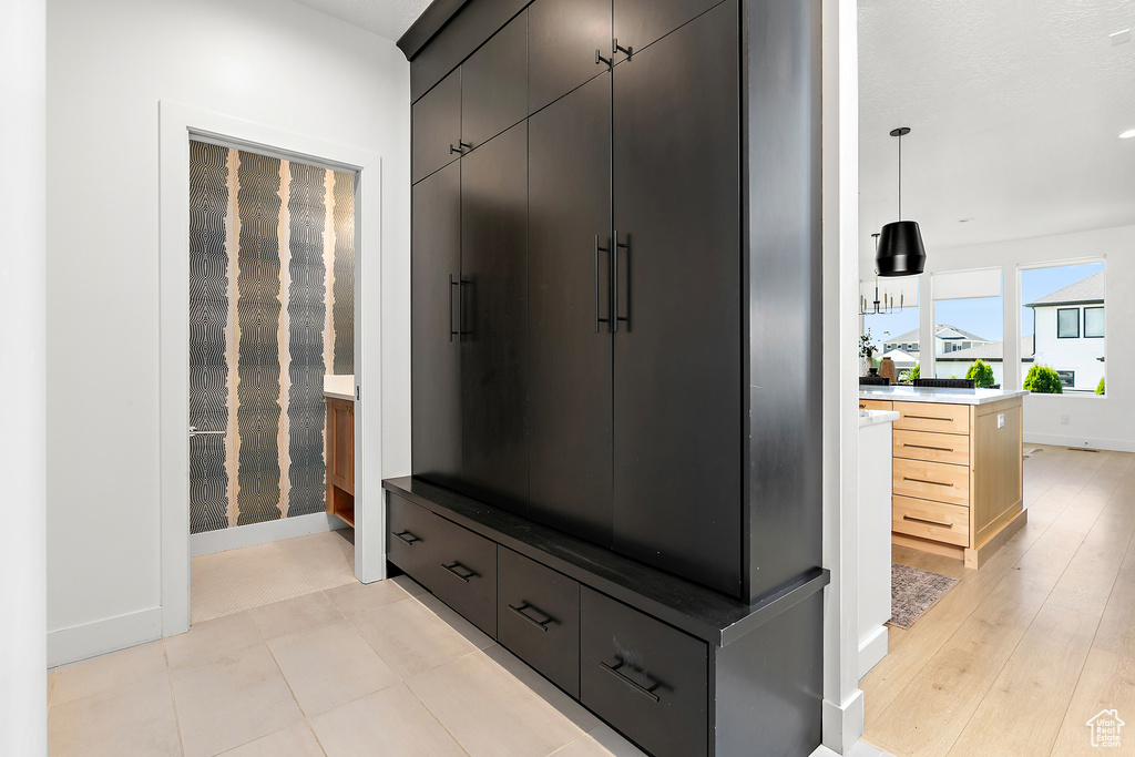 Mudroom featuring baseboards