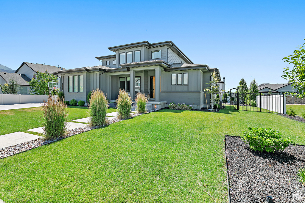 View of front of property with board and batten siding