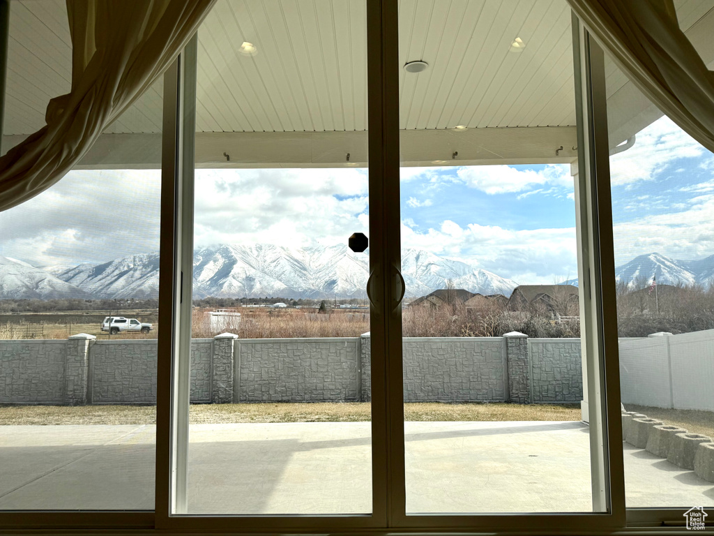 Doorway featuring a mountain view