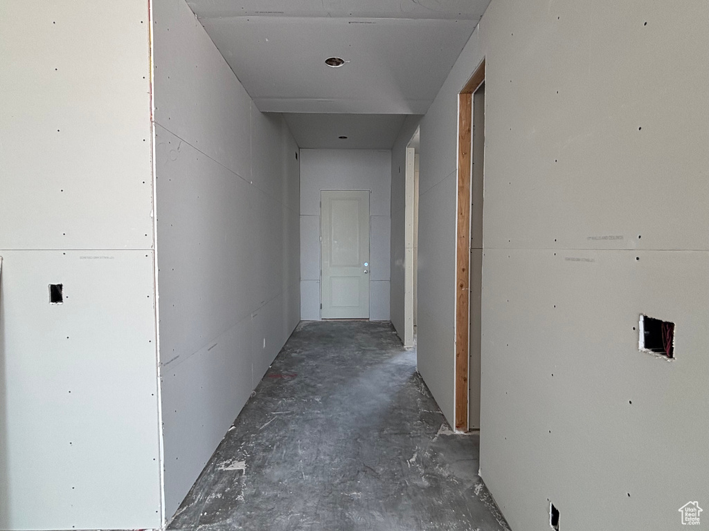 Hallway with concrete floors