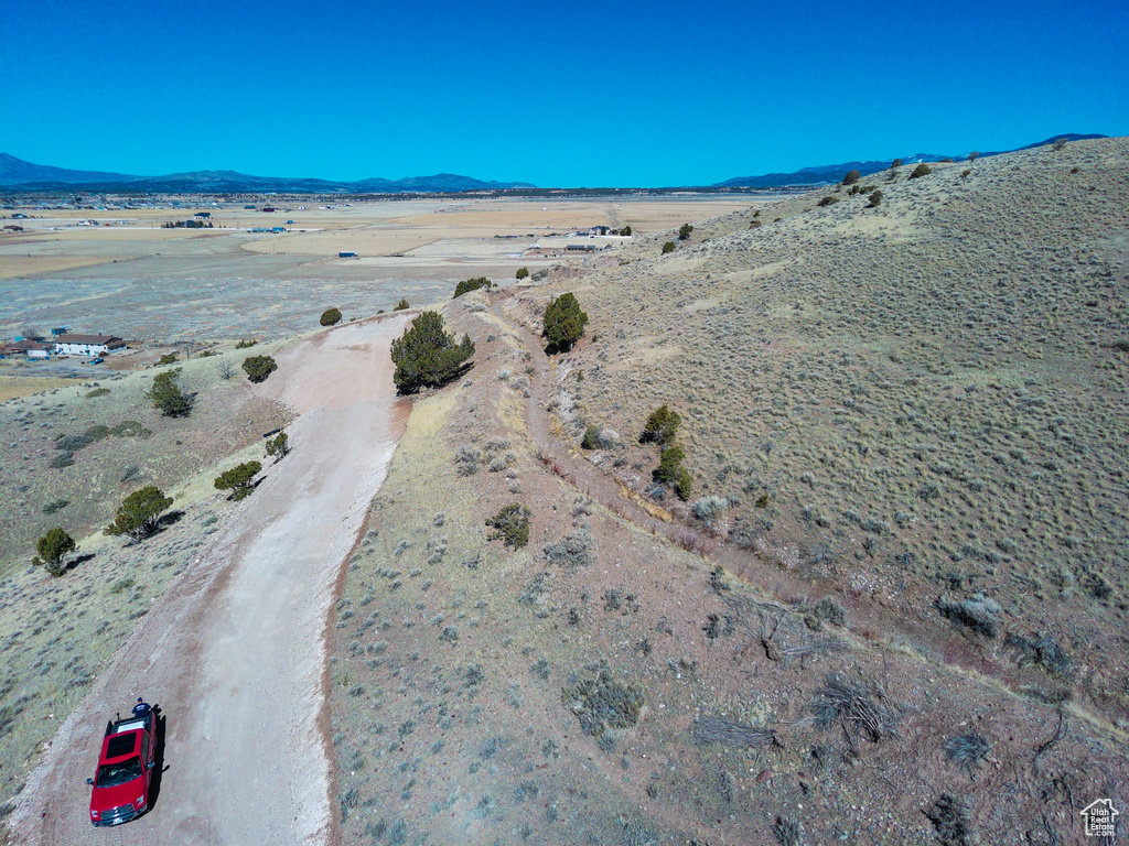 Birds eye view of property featuring a mountain view