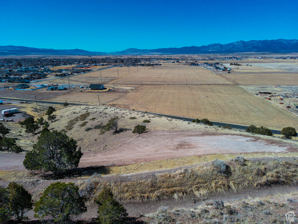 Drone / aerial view featuring a mountain view and a rural view